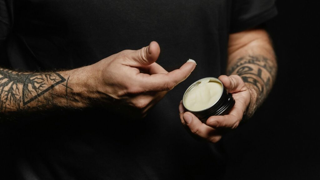 Cannabis topical cream being applied to the skin